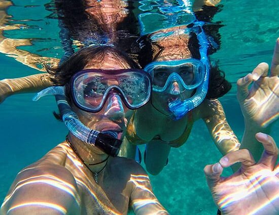 Couple Snorkeling In Cabo San Lucas